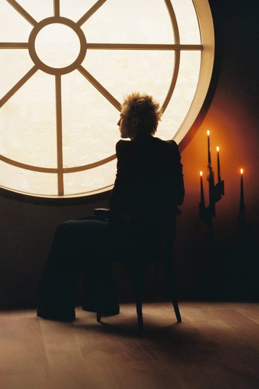 portrait William Guillon, French artist, sculptor, bronze art, looking through the window at the hotel in Bordeaux